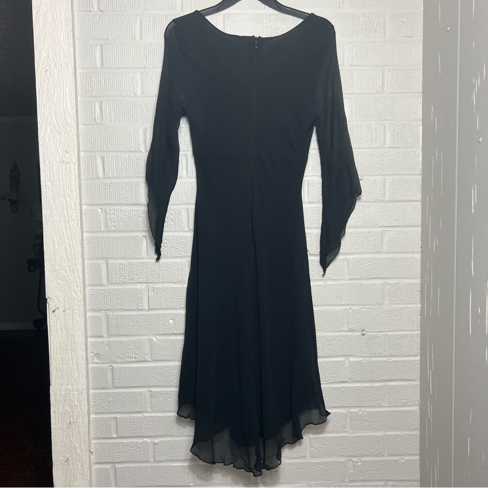 Ametrine Silk size 10 fit n flare black silk dress